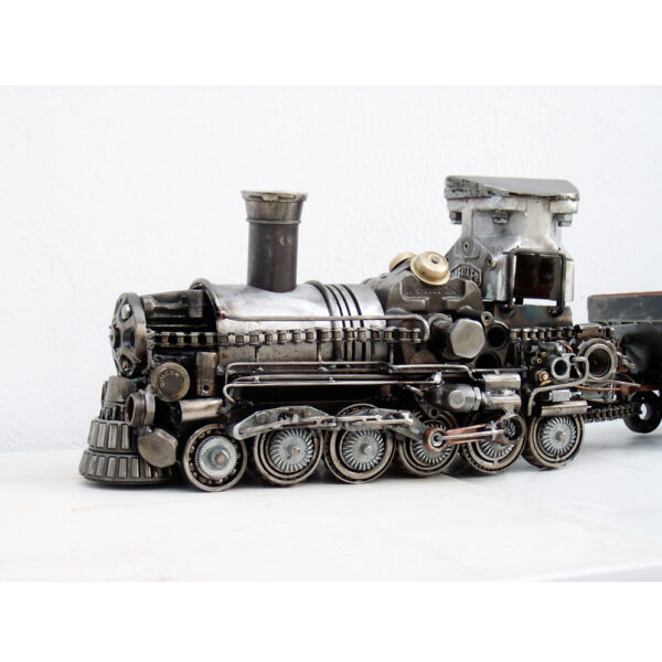 Train artwork made of scrap metal parts